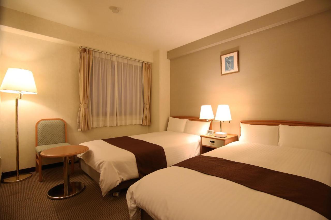 Toyooka Sky Hotel Bagian luar foto