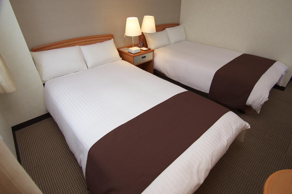 Toyooka Sky Hotel Bagian luar foto